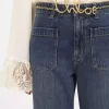 Jeans bootcut corti in denim Jeans bootcut corti in denim