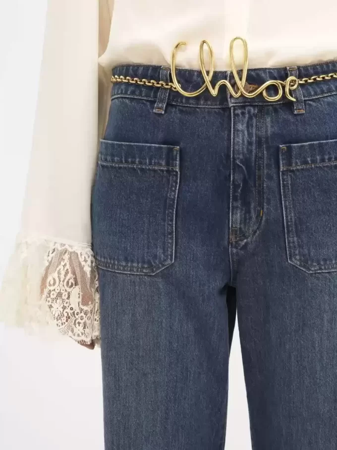 Jeans bootcut corti in denim Jeans bootcut corti in denim