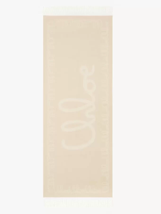 La sciarpa iconica di Chloé in lana jacquard La sciarpa iconica di Chloé in lana jacquard