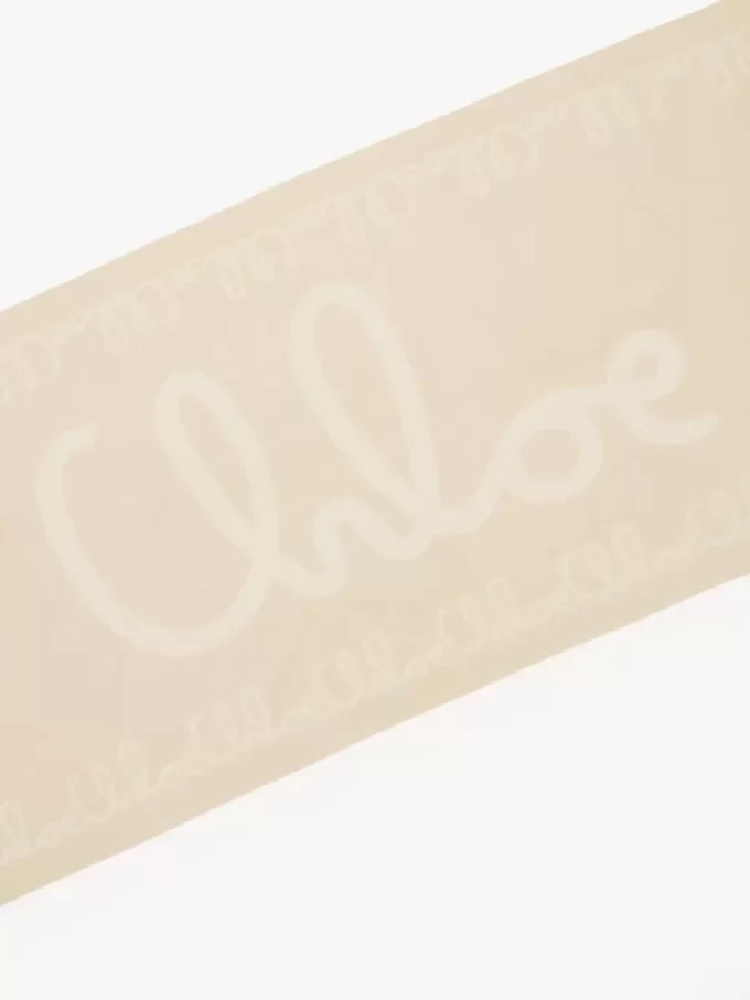 La sciarpa iconica di Chloé in lana jacquard La sciarpa iconica di Chloé in lana jacquard