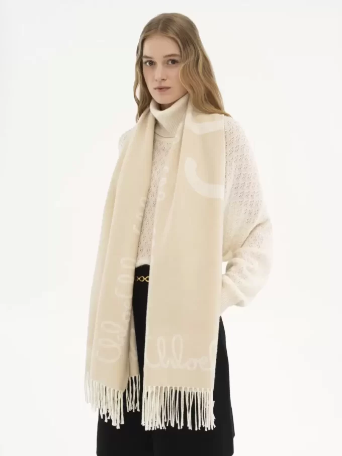 La sciarpa iconica di Chloé in lana jacquard La sciarpa iconica di Chloé in lana jacquard