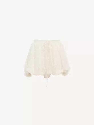 Mini shorts a campana in mousseline di seta con pizzo floreale Mini shorts a campana in mousseline di seta con pizzo floreale