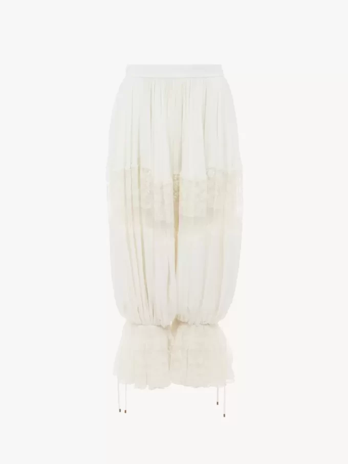 Pantaloni corti fluidi in charmeuse di seta e pizzo Pantaloni corti fluidi in charmeuse di seta e pizzo