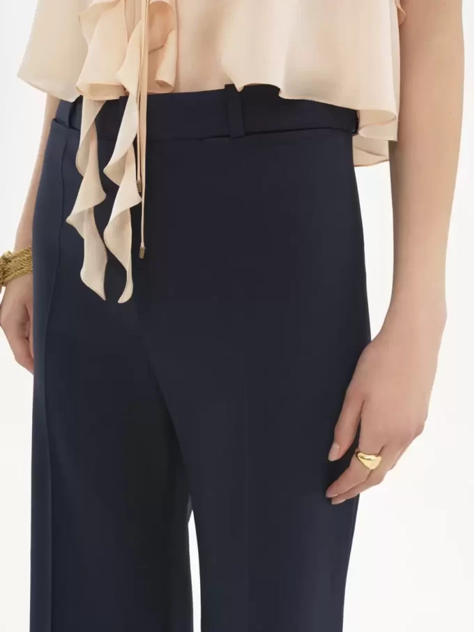 Pantaloni sartoriali svasati in lana elasticizzata Pantaloni sartoriali svasati in lana elasticizzata