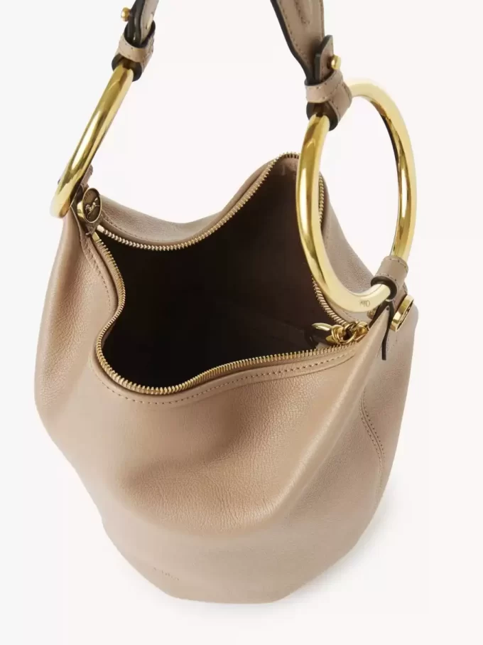 Piccola borsa a mano Bracelet in pelle martellata Piccola borsa a mano Bracelet in pelle martellata