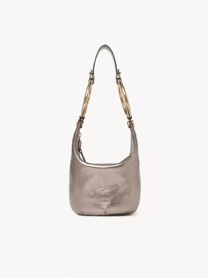 Piccola borsa a mano Bracelet in pelle metallizzata Piccola borsa a mano Bracelet in pelle metallizzata