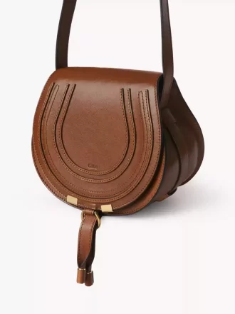 Piccola borsa a sella Marcie in pelle lucida