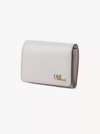 Piccola borsa Chloé Iconic a tre ante con tasca portamonete in pelle martellata Piccola borsa Chloé Iconic a tre ante con tasca portamonete in pelle martellata