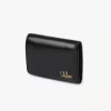 Piccola borsa Chloé Iconic tri-fold con tasca portamonete in pelle lucida Piccola borsa Chloé Iconic tri-fold con tasca portamonete in pelle lucida