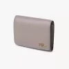 Piccola borsa Chloé Iconic tri-fold con tasca portamonete in pelle lucida Piccola borsa Chloé Iconic tri-fold con tasca portamonete in pelle lucida