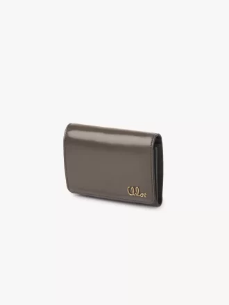 Piccola borsa Chloé Iconic tri-fold con tasca portamonete in pelle lucida