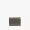 Piccola borsa Chloé Iconic tri-fold con tasca portamonete in pelle lucida Piccola borsa Chloé Iconic tri-fold con tasca portamonete in pelle lucida