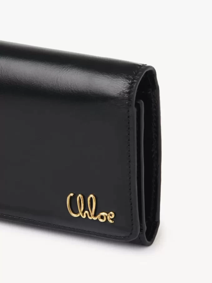 Piccola borsa Chloé Iconic tri-fold con tasca portamonete in pelle lucida Piccola borsa Chloé Iconic tri-fold con tasca portamonete in pelle lucida