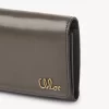 Piccola borsa Chloé Iconic tri-fold con tasca portamonete in pelle lucida Piccola borsa Chloé Iconic tri-fold con tasca portamonete in pelle lucida