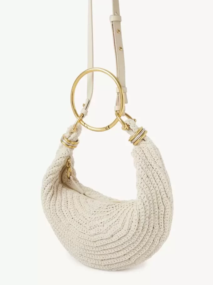 Piccola borsa Hobo con bracciale all’uncinetto Piccola borsa Hobo con bracciale all’uncinetto
