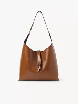 Piccola borsa hobo Marcie in pelle lucida Piccola borsa hobo Marcie in pelle lucida