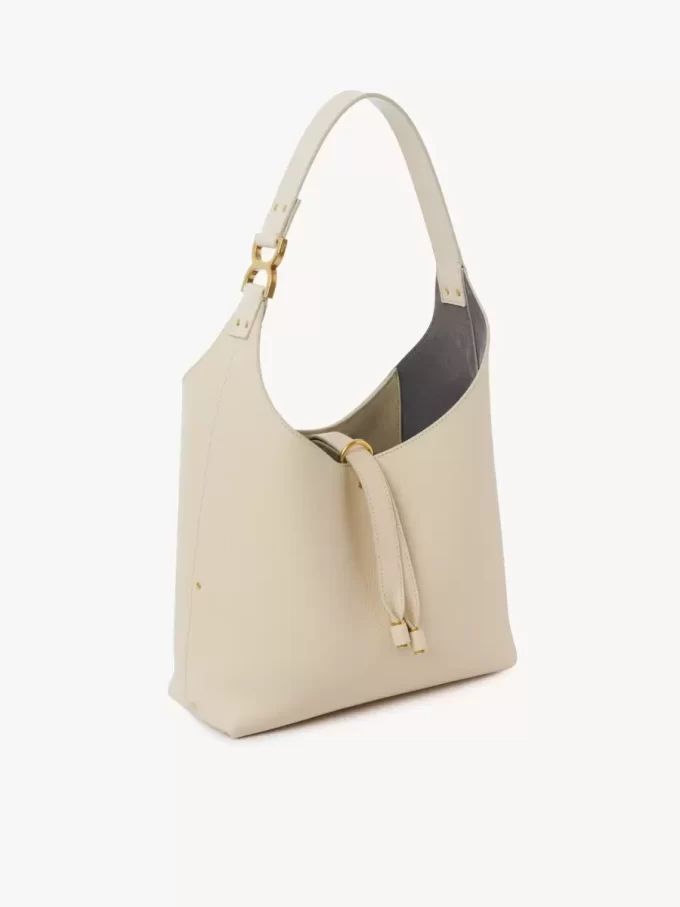 Piccola borsa hobo Marcie in pelle martellata Piccola borsa hobo Marcie in pelle martellata