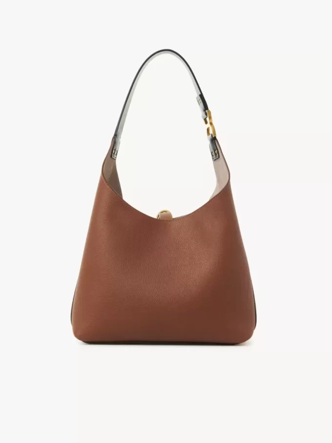 Piccola borsa hobo Marcie in pelle martellata Piccola borsa hobo Marcie in pelle martellata