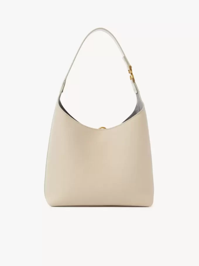 Piccola borsa hobo Marcie in pelle martellata Piccola borsa hobo Marcie in pelle martellata