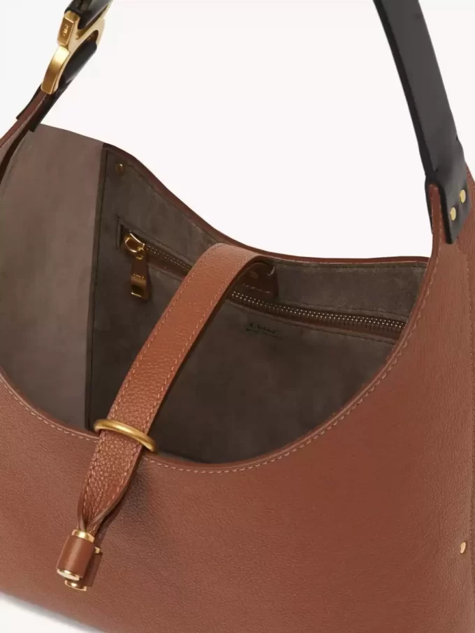 Piccola borsa hobo Marcie in pelle martellata Piccola borsa hobo Marcie in pelle martellata