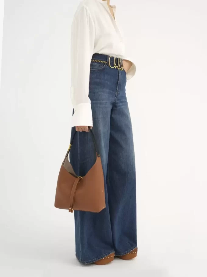 Piccola borsa hobo Marcie in pelle martellata Piccola borsa hobo Marcie in pelle martellata