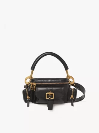 Piccola borsa per macchina fotografica in pelle lucida