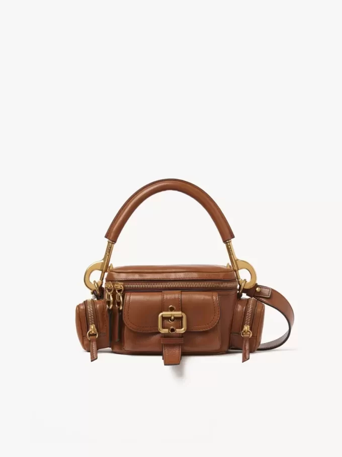 Piccola borsa per macchina fotografica in pelle lucida Piccola borsa per macchina fotografica in pelle lucida