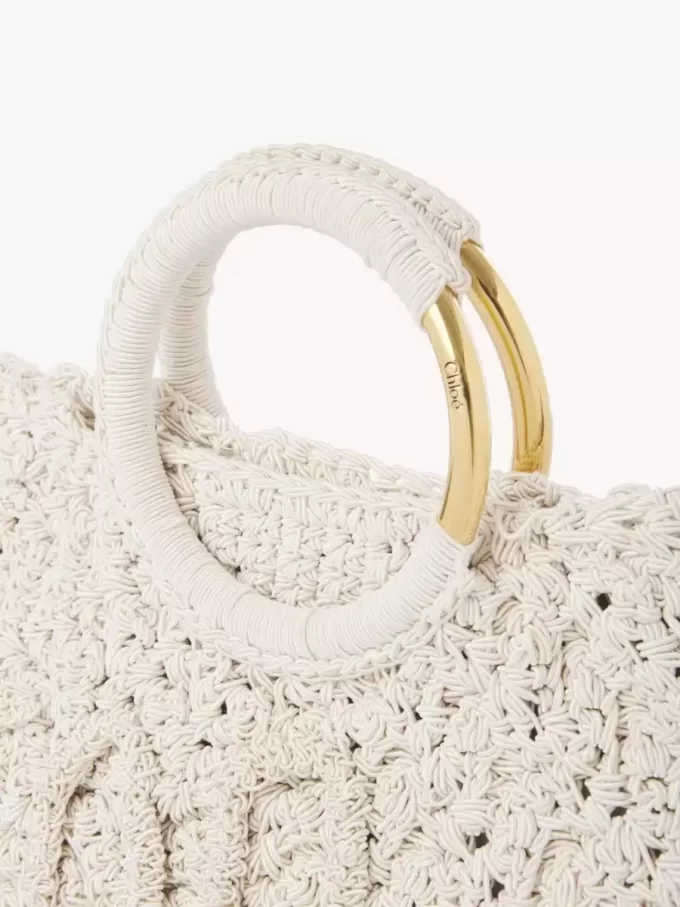 Piccola borsa tote Paravent con bracciale all’uncinetto Piccola borsa tote Paravent con bracciale all’uncinetto