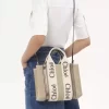 Piccola borsa tote Woody in lino e pelle Piccola borsa tote Woody in lino e pelle