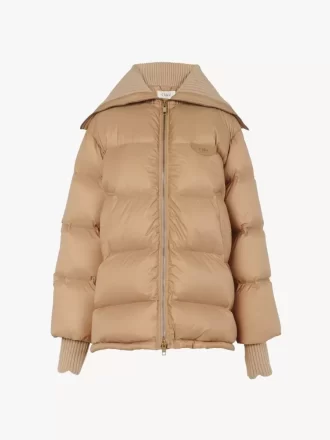 Piumino a collo alto in nylon lucido Piumino a collo alto in nylon lucido