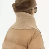 Piumino a collo alto in nylon lucido Piumino a collo alto in nylon lucido