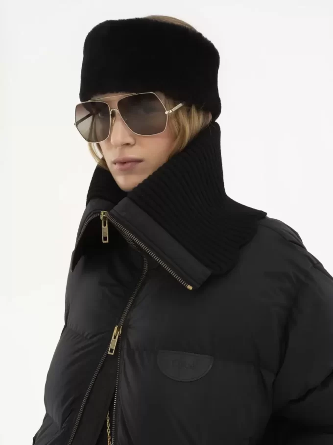 Piumino a collo alto in nylon lucido