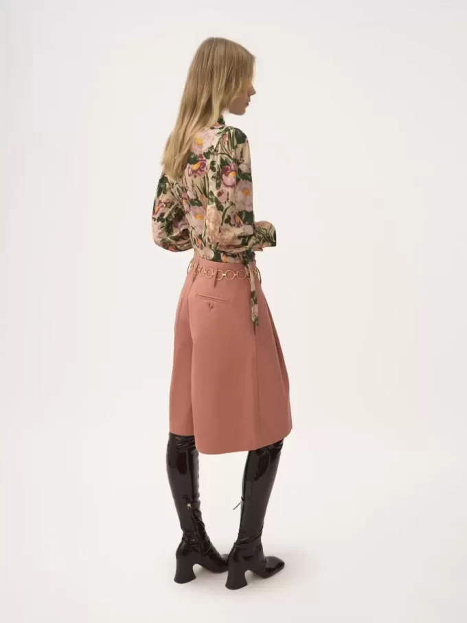 Top a collo alto con bottoni in jersey di lana Top a collo alto con bottoni in jersey di lana