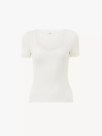 Top aderente con scollo a barchetta in maglia di lana e pizzo Top aderente con scollo a barchetta in maglia di lana e pizzo