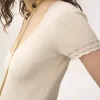 Top aderente con scollo a barchetta in maglia di lana e pizzo Top aderente con scollo a barchetta in maglia di lana e pizzo