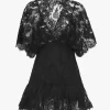 Top aderente con volant in pizzo Top aderente con volant in pizzo