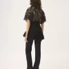 Top aderente con volant in pizzo Top aderente con volant in pizzo