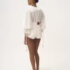 Top con scollo a V e maniche a sbuffo in voile di cotone Top con scollo a V e maniche a sbuffo in voile di cotone