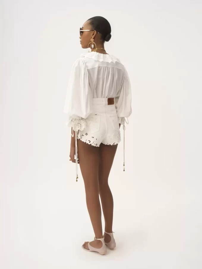 Top con scollo a V e maniche a sbuffo in voile di cotone Top con scollo a V e maniche a sbuffo in voile di cotone