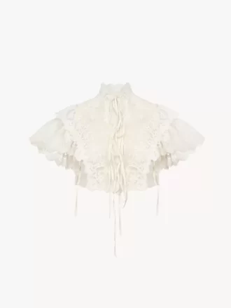 Top corto a collo alto in tulle di cotone e pizzo Top corto a collo alto in tulle di cotone e pizzo