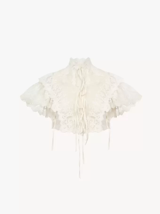 Top corto a collo alto in tulle di cotone e pizzo Top corto a collo alto in tulle di cotone e pizzo