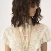 Top corto a collo alto in tulle di cotone e pizzo Top corto a collo alto in tulle di cotone e pizzo