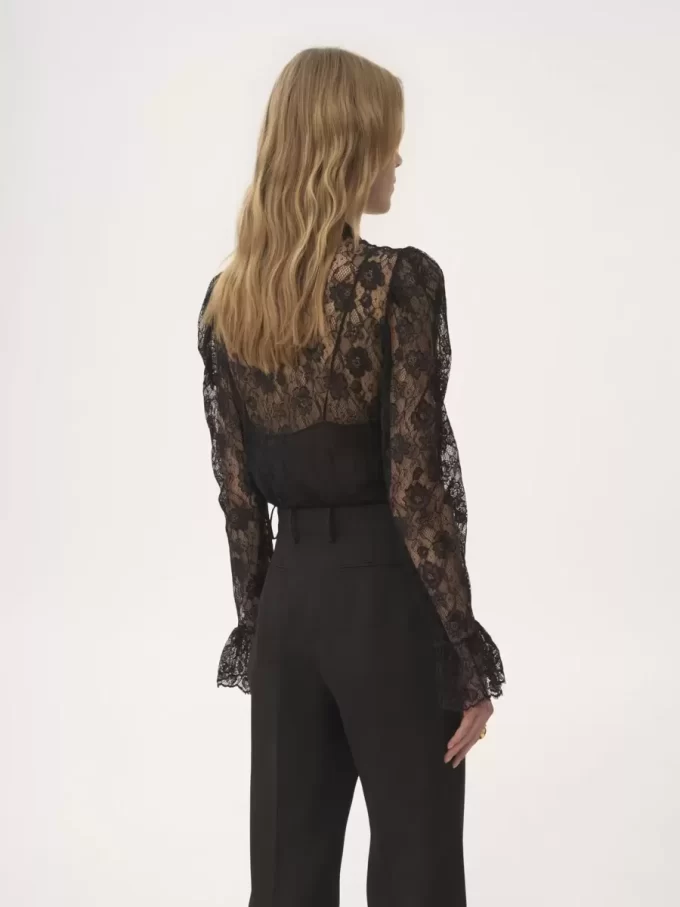 Top lavallière con maniche a sbuffo in jacquard di pizzo floreale Top lavallière con maniche a sbuffo in jacquard di pizzo floreale