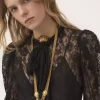 Top lavallière con maniche a sbuffo in jacquard di pizzo floreale Top lavallière con maniche a sbuffo in jacquard di pizzo floreale