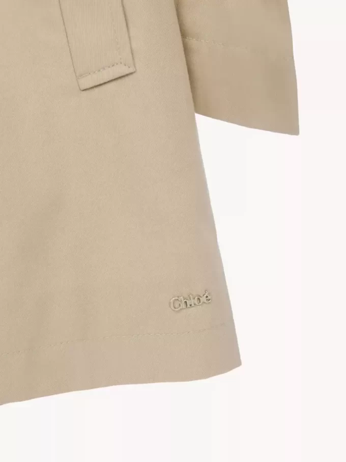 Trench con cappuccio Trench con cappuccio